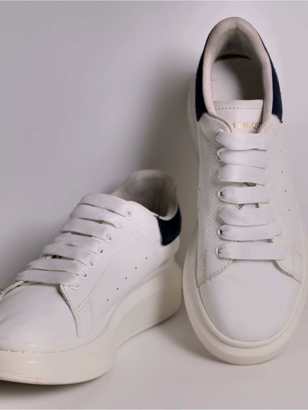 White Leather Women’s Sneakers with Navy Heel Accent